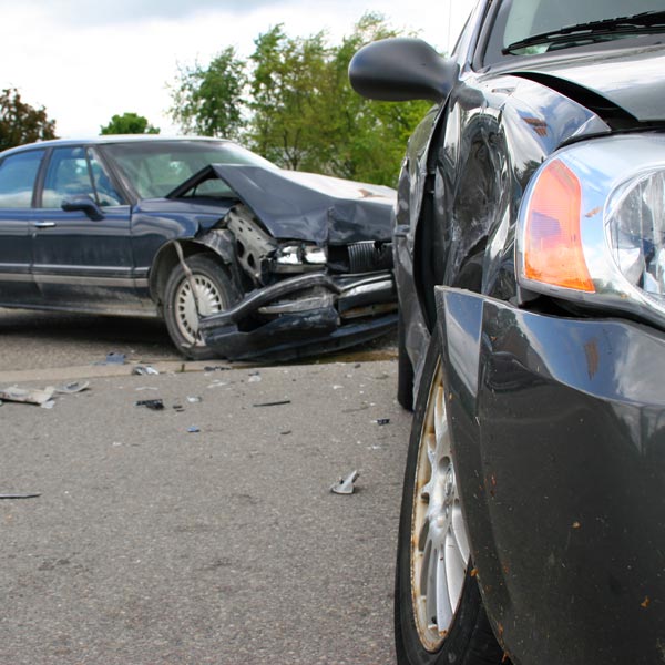 front of car in accident with wrecked car behind it