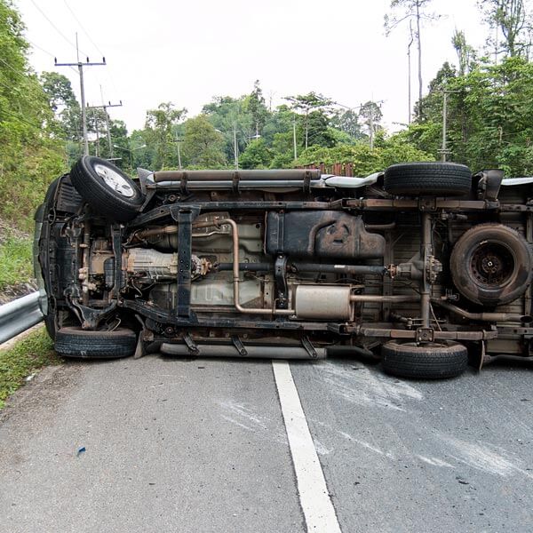 car flipped on side in accident